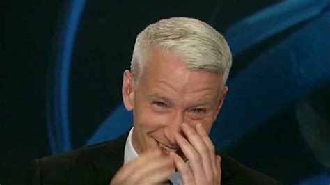 watch anderson cooper giggles.